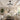 model 9019 luxury black crystal retractable ceiling fan installed in a modern elegant living room ambient