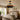 Farmhouse style ceiling fan light in a warm and cozy bedroom with wood furniture
