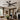 Kviflon 8235 56 inch rustic farmhouse ceiling fan with light installed in a high-ceiling modern industrial living room.