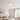 Black 42 inch flush mount ceiling fan with light installed in a modern bedroom