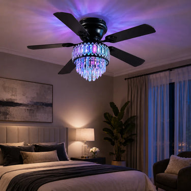 Elegant Kviflon 8345 matte black crystal chandelier fan running whisper-quietly in a luxury master bedroom with warm romantic ambient lighting.