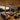 Kviflon 9001 giant 100 inch industrial ceiling fan with light installed on a luxury wooden ceiling covered patio, outdoor open living room decor.