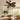 Cozy rustic style living room decor with a 52 inch palm leaf ceiling fan light installed near large glass doors.