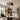 Model 8918 dark brown woven leaf ceiling fan with LED light installed in a modern living room.