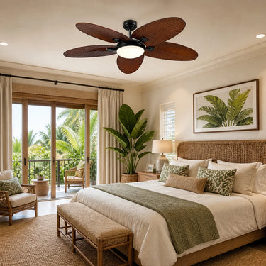Tropical resort style master bedroom with a large 62 inch brown palm leaf ceiling fan light installed on the ceiling.