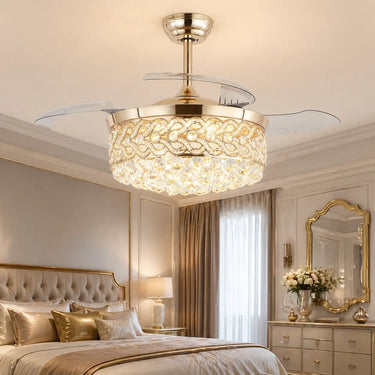 9020 Luxury Retractable Crystal Fandelier in Gold Finish installed in a cozy elegant master bedroom