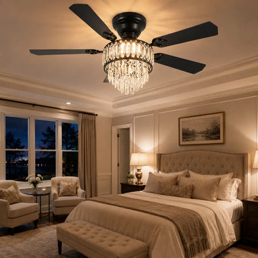 Elegant Kviflon 8345 matte black crystal chandelier fan running whisper-quietly in a luxury master bedroom with warm romantic ambient lighting.