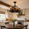 Farmhouse style ceiling fan light above a rustic dining table in a cozy dining room