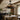 Farmhouse style ceiling fan light above a round dining table in a bright kitchen dining area
