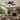 Kviflon 6666 low profile ceiling fan with light installed in a covered patio setting