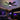 Kviflon 8233 RGB ceiling fan with color changing ring light installed in a gaming room