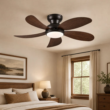 Black 42 inch flush mount ceiling fan with light installed in a modern bedroom