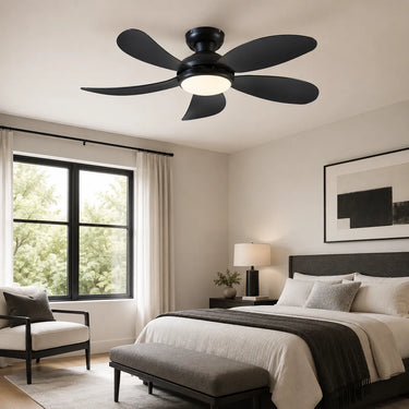 Black 42 inch flush mount ceiling fan with light installed in a modern bedroom