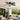 Black 42 inch flush mount ceiling fan with light installed in a outdoor patio