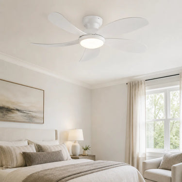 Black 42 inch flush mount ceiling fan with light installed in a modern bedroom