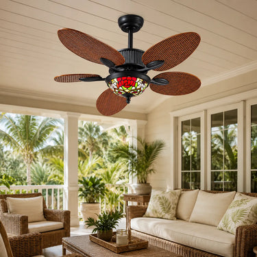 Kviflon 8250 wet-rated tropical ceiling fan with Tiffany light installed in a covered patio