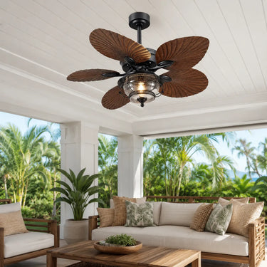 Kviflon 8309 wet-rated outdoor palm leaf ceiling fan with light installed in a covered patio