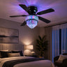 Elegant Kviflon 8345 matte black crystal chandelier fan running whisper-quietly in a luxury master bedroom with warm romantic ambient lighting.