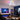 Kviflon 8922 RGB Bluetooth ceiling fan with light installed in a gaming room